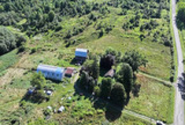 94 Acre Farm With House & Barns