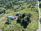 94 Acre Farm With House & Barns
